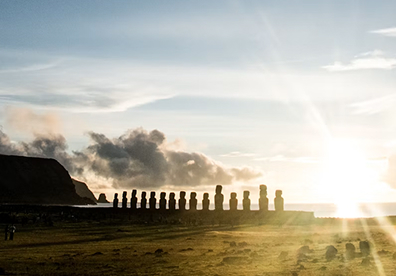 Easter Island, Rapa Nui in Chile. At sunrise, Ahu Tongariki can create striking silhouettes. Keep the full platform in frame and leave space around the moai to show their setting.
