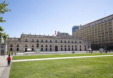 La Moneda, Presidential Palace in Chile. Use the broad civic plazas to step back and keep the palace's long facade straight. Morning light can give its pale walls gentle definition.