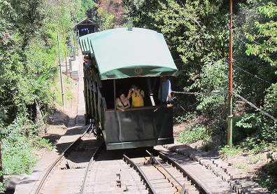 Santiago Metropolitan Park in Chile. Climbing Cerro San Crist&oacute;bal since 1925, Santiago&rsquo;s historic funicular has spent over a century pulling travelers up the slope in its iconic wooden-style cars.